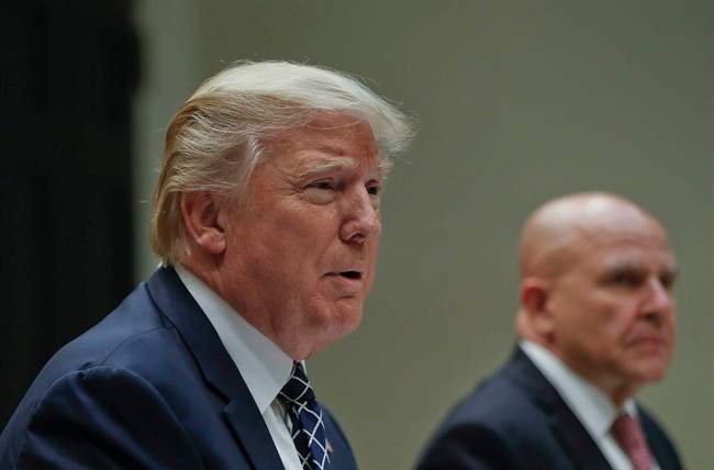 President Donald Trump, with National Security Adviser H.R. McMaster, right, speaks while having lunch with services members in the Roosevelt Room of the White House in Washington, July 18, 2017.
