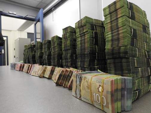 Edmonton police show more than $1 million that was seized in a drug investigation, Friday, July 28, 2017. 