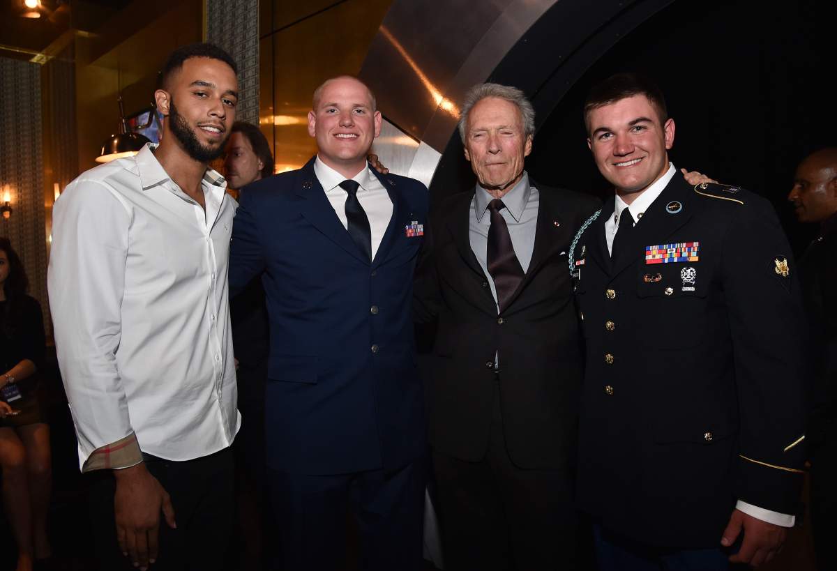  (L-R) Honorees Anthony Sadler and Airman First Class Spencer Stone, actor/director Clint Eastwood, and honoree Specialist Alek Skarlatos attend Spike TV's 10th Annual Guys Choice Awards at Sony Pictures Studios on June 4, 2016.