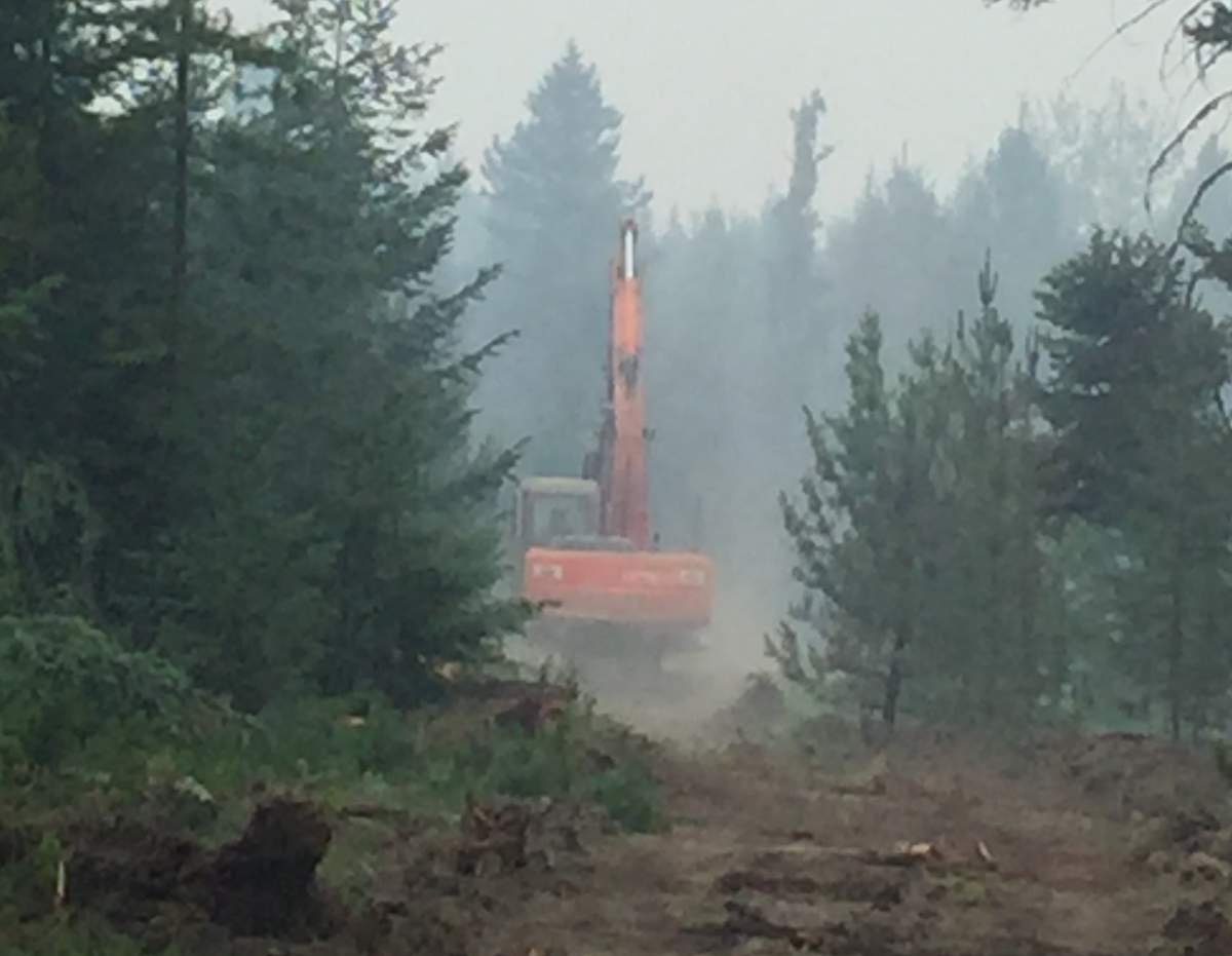Ranchers carve out their own fire lines in a bid to protect their homes.