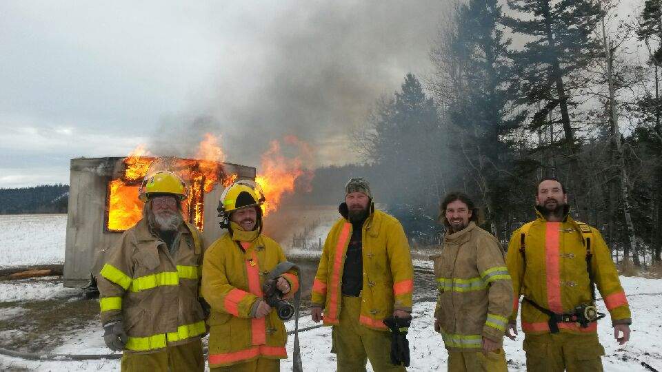Ian Hicks (second from right) said most of the department’s volunteers work at the nearby mine.