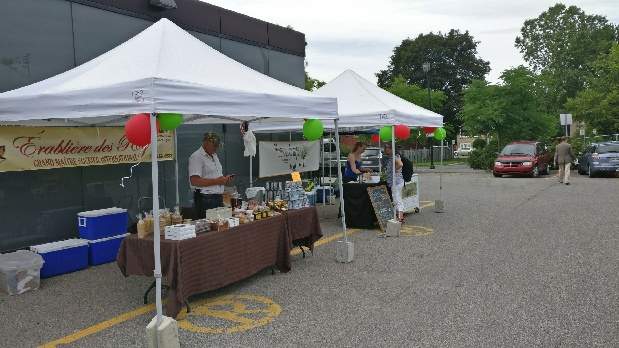 Two of the eight stands featured at the Pierrefonds Public Market. Friday, July 7, 2017.