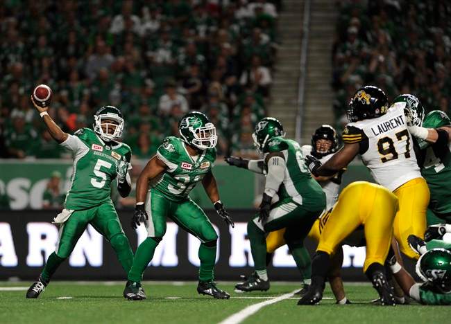 Saskatchewan Roughriders quarterback Kevin Glenn (5) attempts a pass during second half CFL football action against the Hamilton Tiger-Cats in Regina on Saturday, July 8, 2017. 