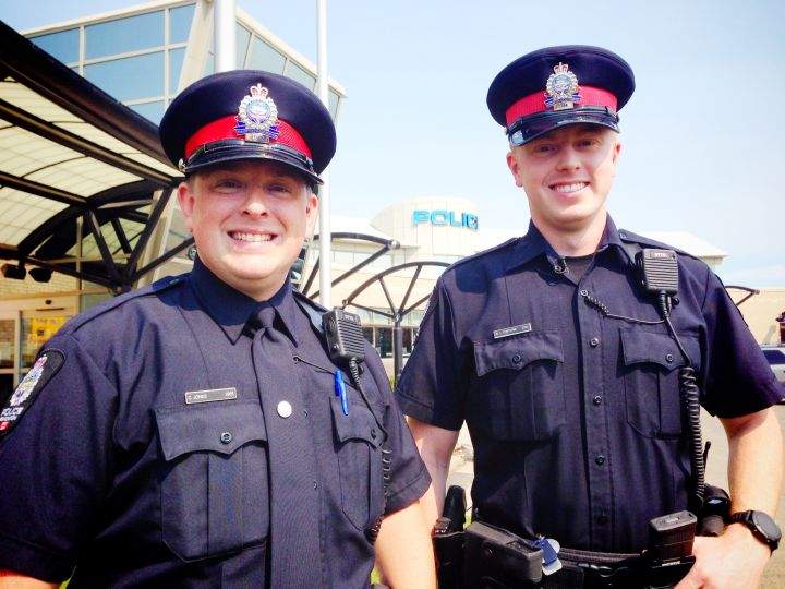 Const. Cameron Jones (L) and his partner Const. Brendan Fonteyne.