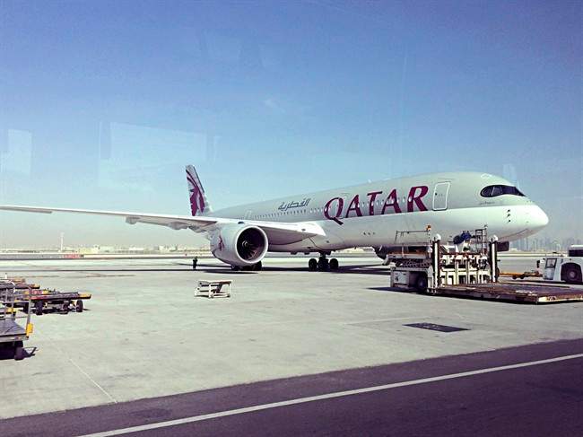 This June 6, 2017, file photo shows a parked Qatari plane in Hamad International Airport in Doha, Qatar. 