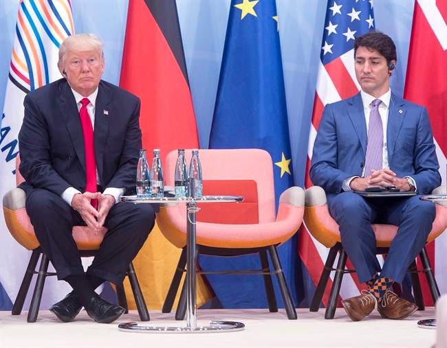 Prime Minister Justin Trudeau, right, and United States President Donald Trump take part in a Women and Development event at the G20 summit Saturday, July 8, 2017 in Hamburg, Germany.