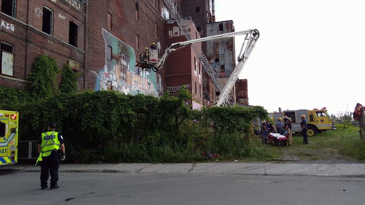 A 15-year-old boy is in hospital after falling from the eighth floor of Canada Malting Silos building in Saint-Henri, Monday, July 31, 2017.