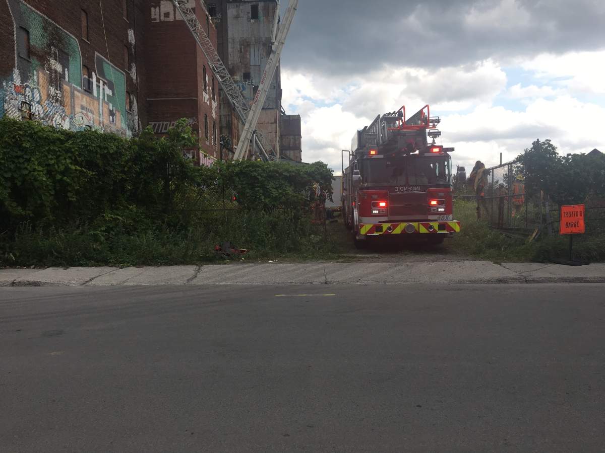 A 15-year-old boy is in hospital after falling from the eighth floor of Canada Malting Silos building in Saint-Henri, Monday, July 31, 2017.