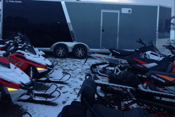 Thieves steal five snowmobiles and a trailer from a dealership south of Saskatoon.