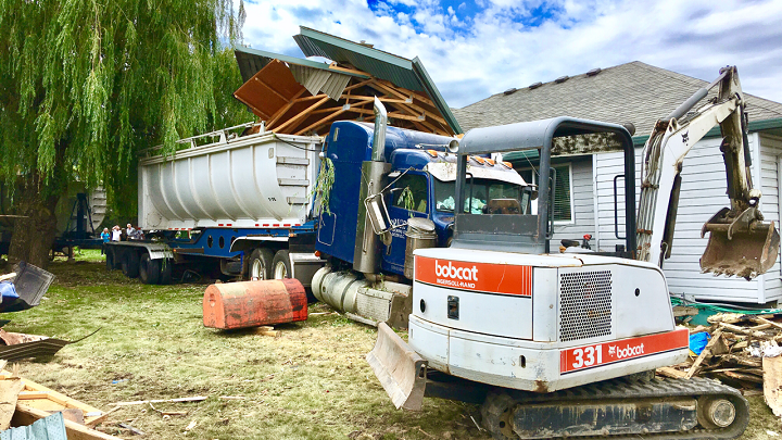 Semi-truck hits cow, crashes into house on Highway 97A in Armstrong, B.C. - image