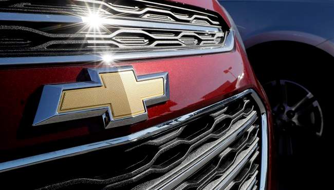 In this April 25, 2017, photo, a Chevrolet truck sits in a General Motors dealer's lot in Nashville, Tenn.