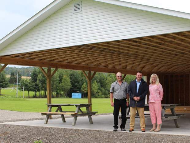 This picture was distributed with the press release on Sept. 1, 2016 from the Atlantic Canada Opportunities Agency — the federal government regional economic development agency — when it announced funding for the picnic shelter in this photo. That’s Liberal MP TJ Harvey in the middle.