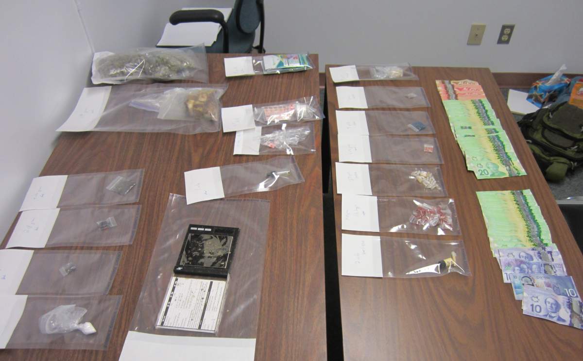 RCMP seized drugs and $2,980 in cash following a traffic stop in Turner Valley on July 11, 2017.