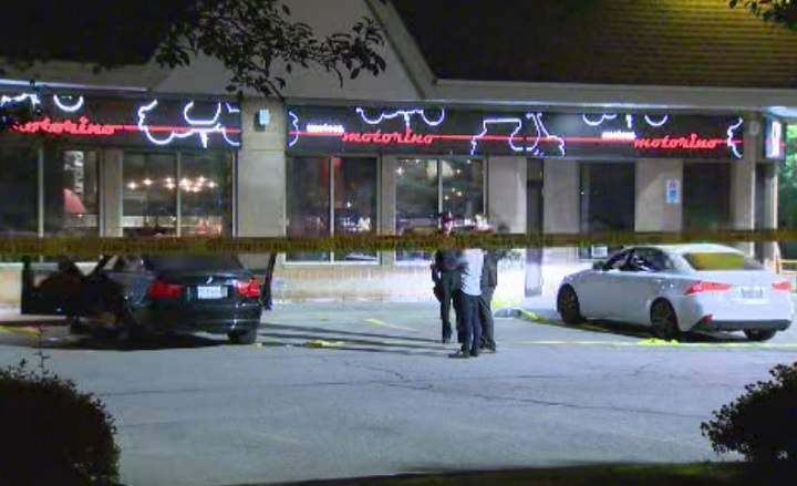 Police investigate a shooting outside the Motorino Enoteca restaurant in Vaughan, Ont., on July 10, 2017.