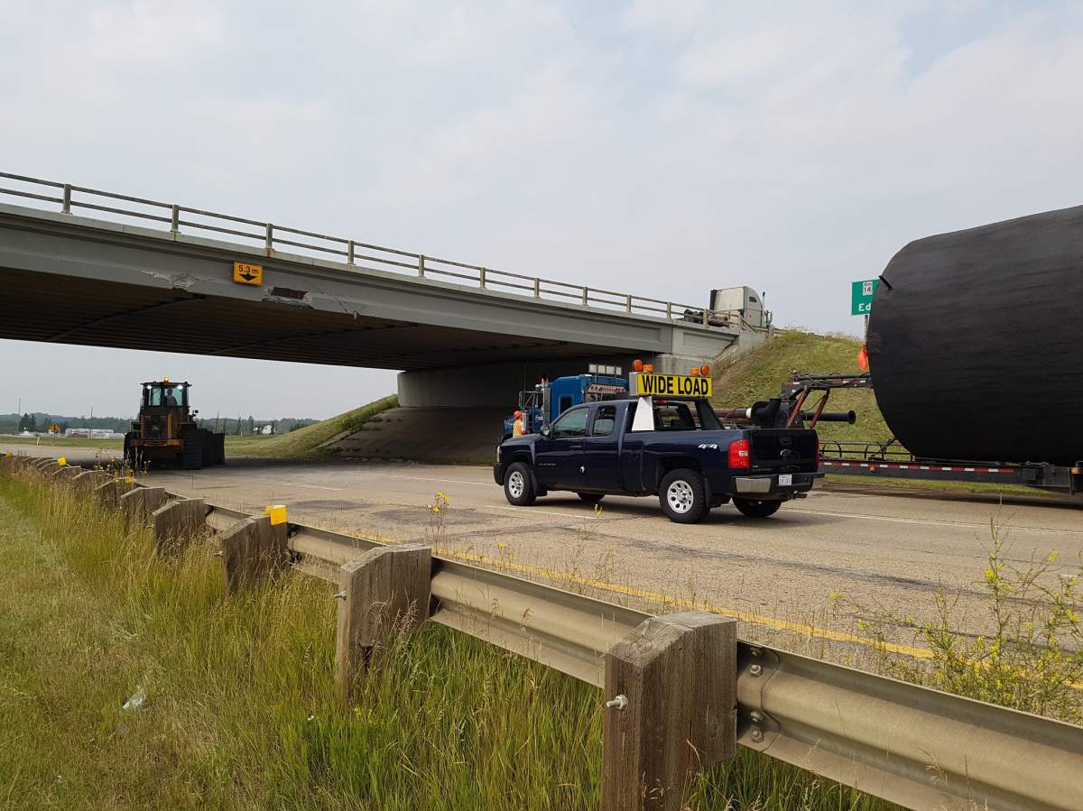 A high load hits the overpass on Highway 14 at Highway 21.