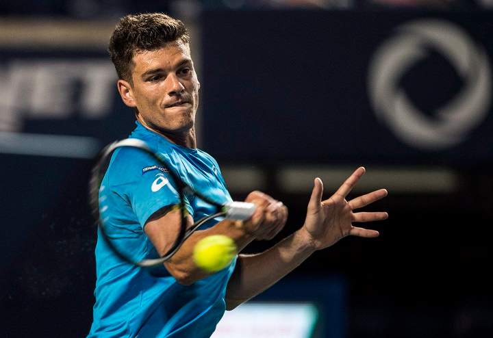 In this 2016 file photo, Frank Dancevic, of Canada, returns to Sam Querrey, of the United States, during men's first round Rogers Cup tennis action in Toronto On Sunday, . Dancevic failed to advance to the
Rogers Cup main draw at Montreal's Uniprix Stadium. Sunday, Aug. 6, 2017.