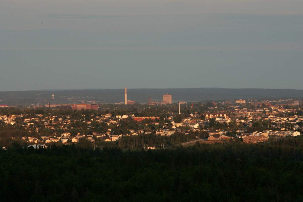 The sunset casts a warm light on the Moncton, N.B. skyline on Thursday July 6, 2006.