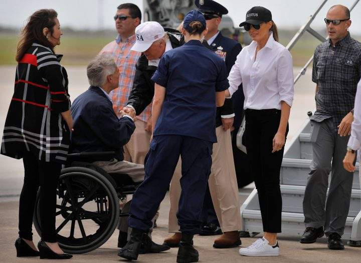 U.S. President Donald Trump and first lady Melania Trump are greeted by Texas Governor Greg Abbott prior to receiving a briefing on Tropical Storm Harvey relief efforts in Corpus Christi, Texas.