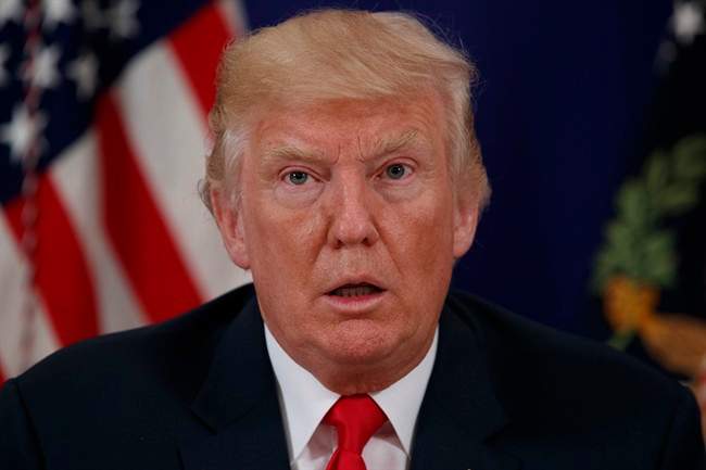 President Donald Trump pauses as he speaks to reporters after a security briefing at Trump National Golf Club in Bedminster, N.J., Thursday, Aug. 10, 2017. 