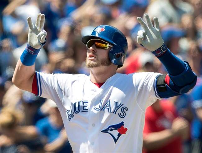 Toronto Blue Jays Josh Donaldson crosses home plate after hitting a two-run home run against the Pittsburgh Pirates in the first inning of their interleague MLB baseball game in Toronto on Sunday, August 13, 2017.