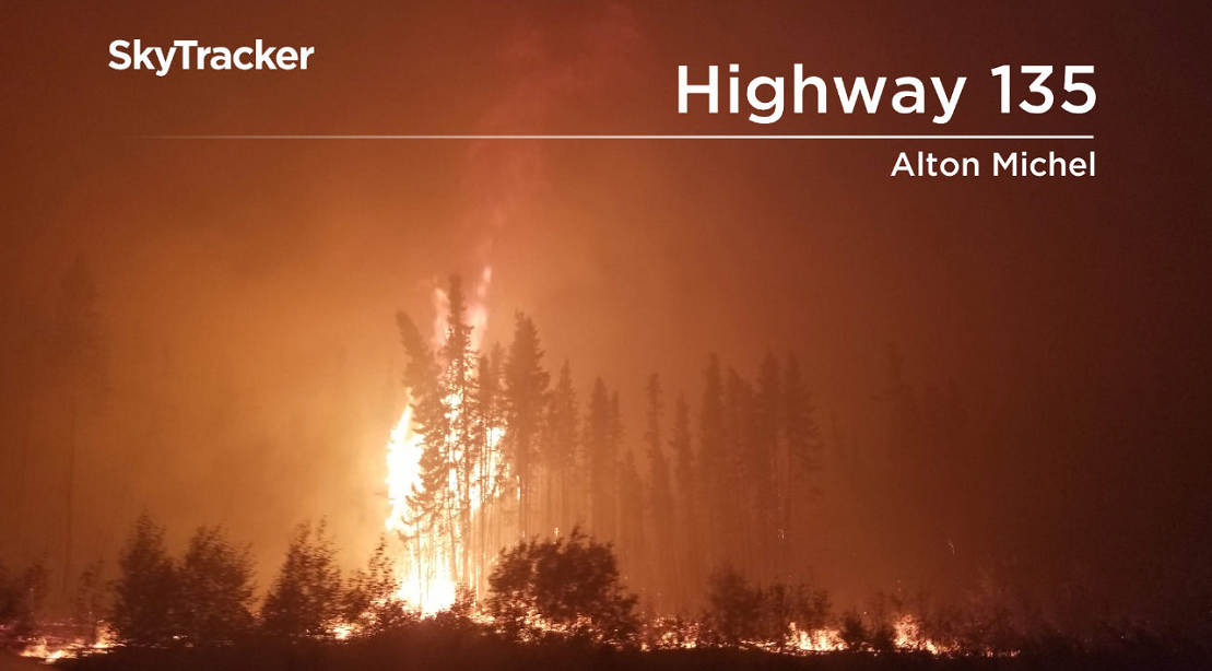 Fire burning along Highway 135 south of Pelican Narrows Thursday evening.