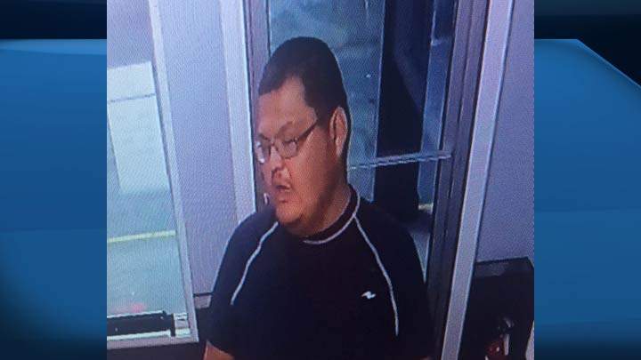 Battlefords RCMP have released surveillance photos in an attempt to identify a man who tried to rob a business armed with a projector screen on Tuesday.