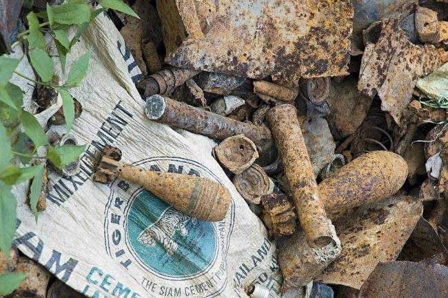 A pile of Vietnam War-era bomb scrap, shrapnel and cluster bombs along the old Ho Chi Minh Trail in Laos.