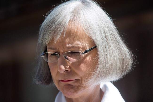 Marion Buller, Chief Commissioner of the National Inquiry into Missing and Murdered Indigenous Women and Girls, pauses while speaking to a reporter after a news conference at Haida House at the Museum of Anthropology, in Vancouver on Thursday, July 6, 2017.