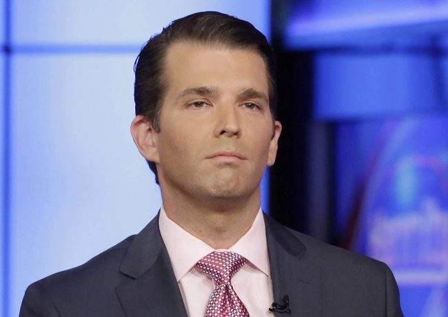 In this July 11, 2017, file photo, Donald Trump Jr. is interviewed by host Sean Hannity on his Fox News Channel television program, in New York. 