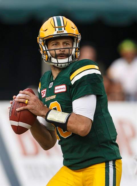 Edmonton Eskimos quarterback Mike Reilly (13) looks to make the throw against the B.C. Lions during first half CFL action in Edmonton, Alta., on Friday July 28, 2017.