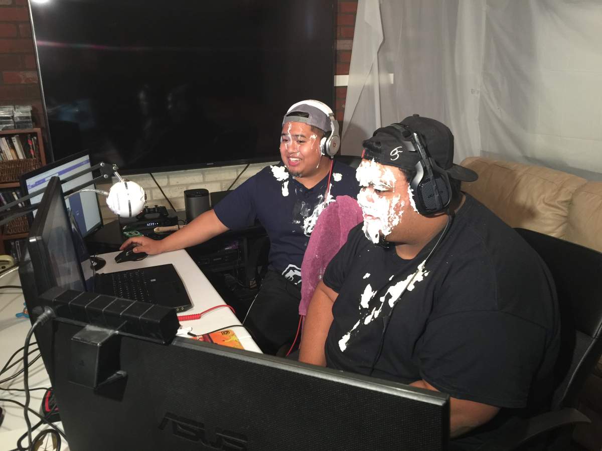 Brothers Daniel and Deril Carranza celebrated $500 in donations to Winnipeg Children's Hospital Foundation by getting a pie in the face.