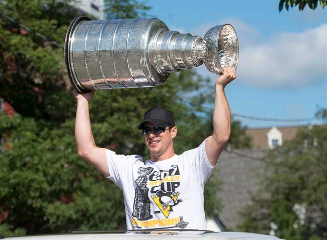 Pittsburgh Penguins captain Sidney Crosby parades the Stanley Cup in Halifax on Monday, Aug. 7, 2017. Crosby, the parade grand marshal, is a three-time Stanley Cup champion and was celebrating his 30th birthday.