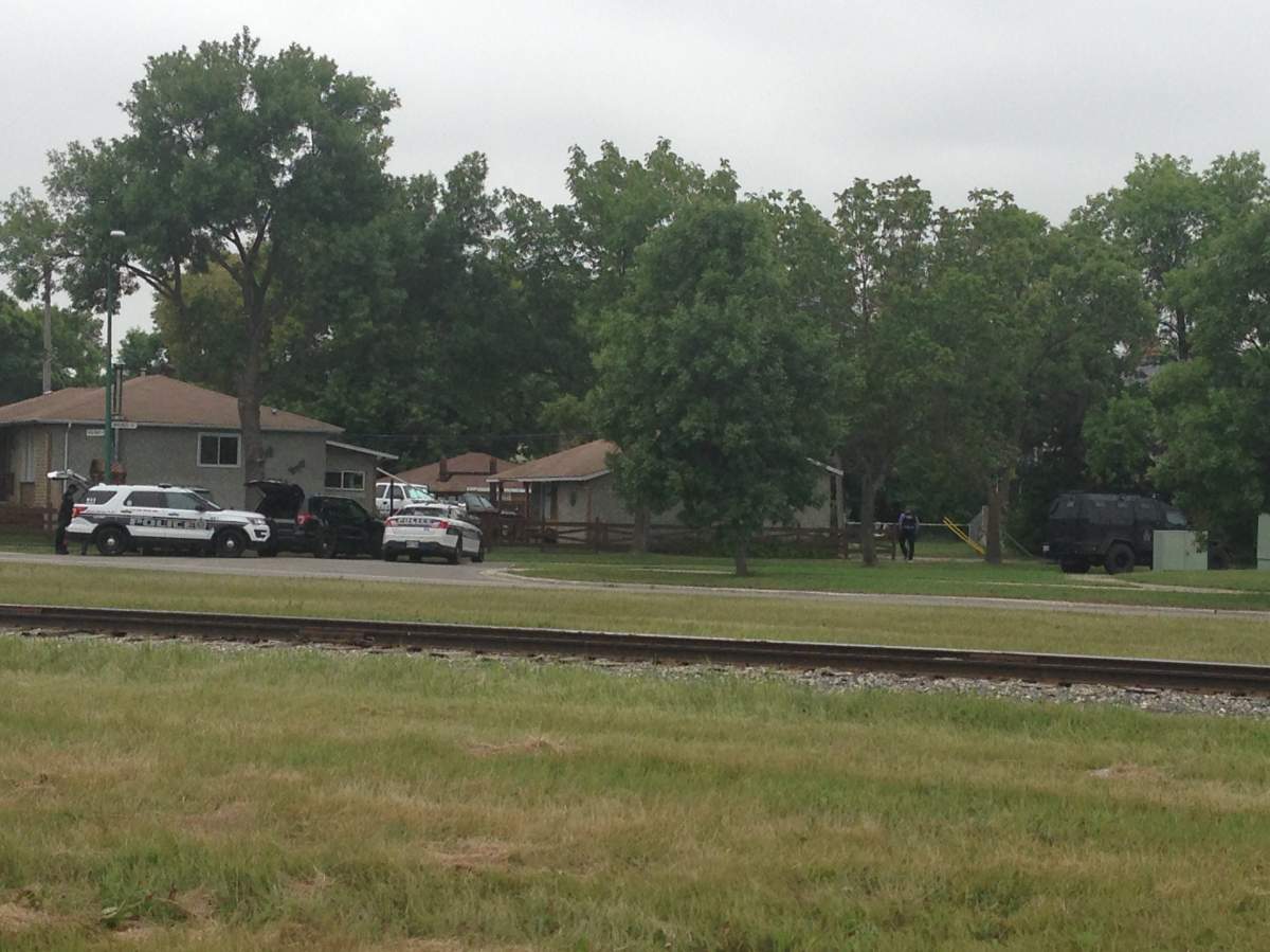Winnipeg Police during the nine hour standoff in the Burrows - Keewatin area Saturday.