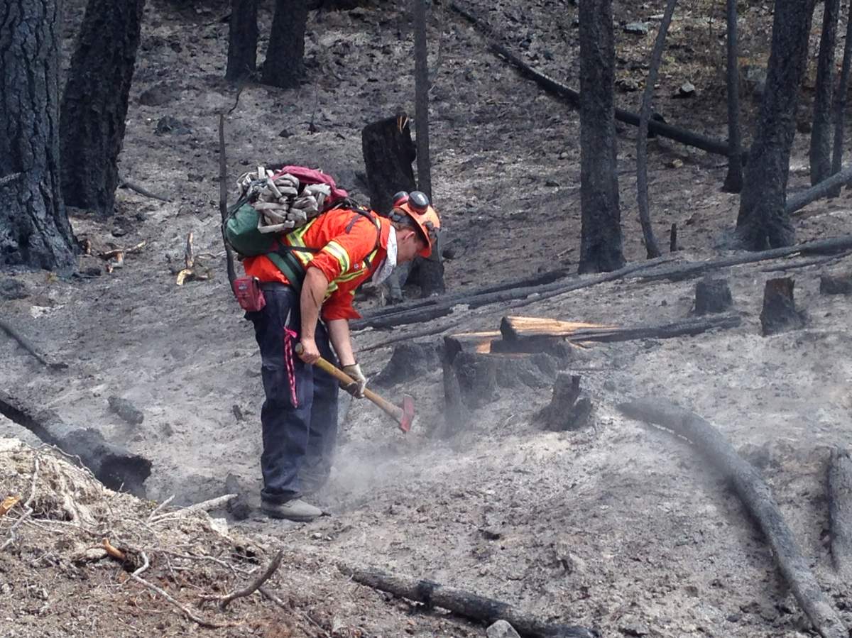 BC Wildfire Service fire fighter at work during Summer 2018 on one of the province's many forest fires.