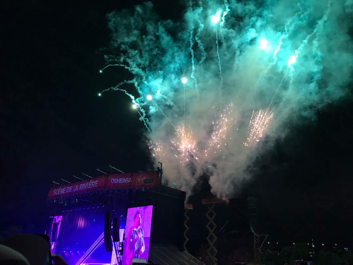 Fireworks go off during The Weeknd's show at the 2017 Osheaga music and art festival.