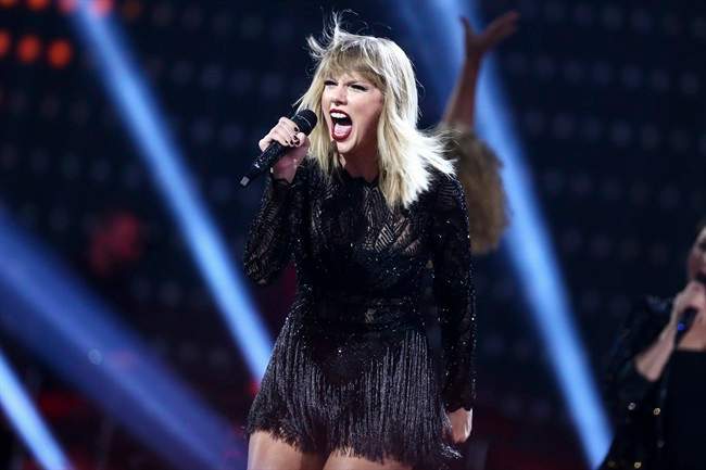  In this Feb. 4, 2017 file photo, Taylor Swift performs at the DIRECTV NOW Super Saturday Night Concert in Houston, Texas. 
