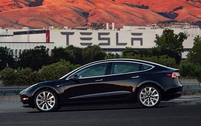 This file image provided by Tesla Motors shows the Tesla Model 3 sedan. 