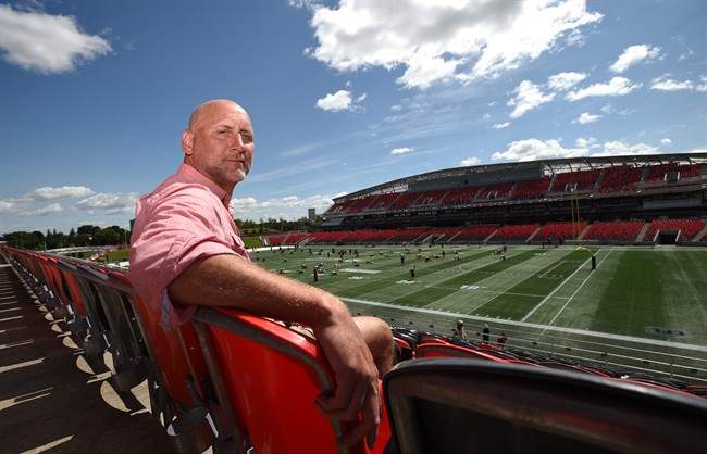 Former CFL player Ken Evraire poses for a photo at TD Place in Ottawa on Wednesday, Aug. 16, .