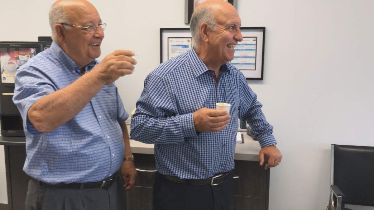 Brothers Tony and Mario Scione in their hair salon on Thursday, August 17, 2017.