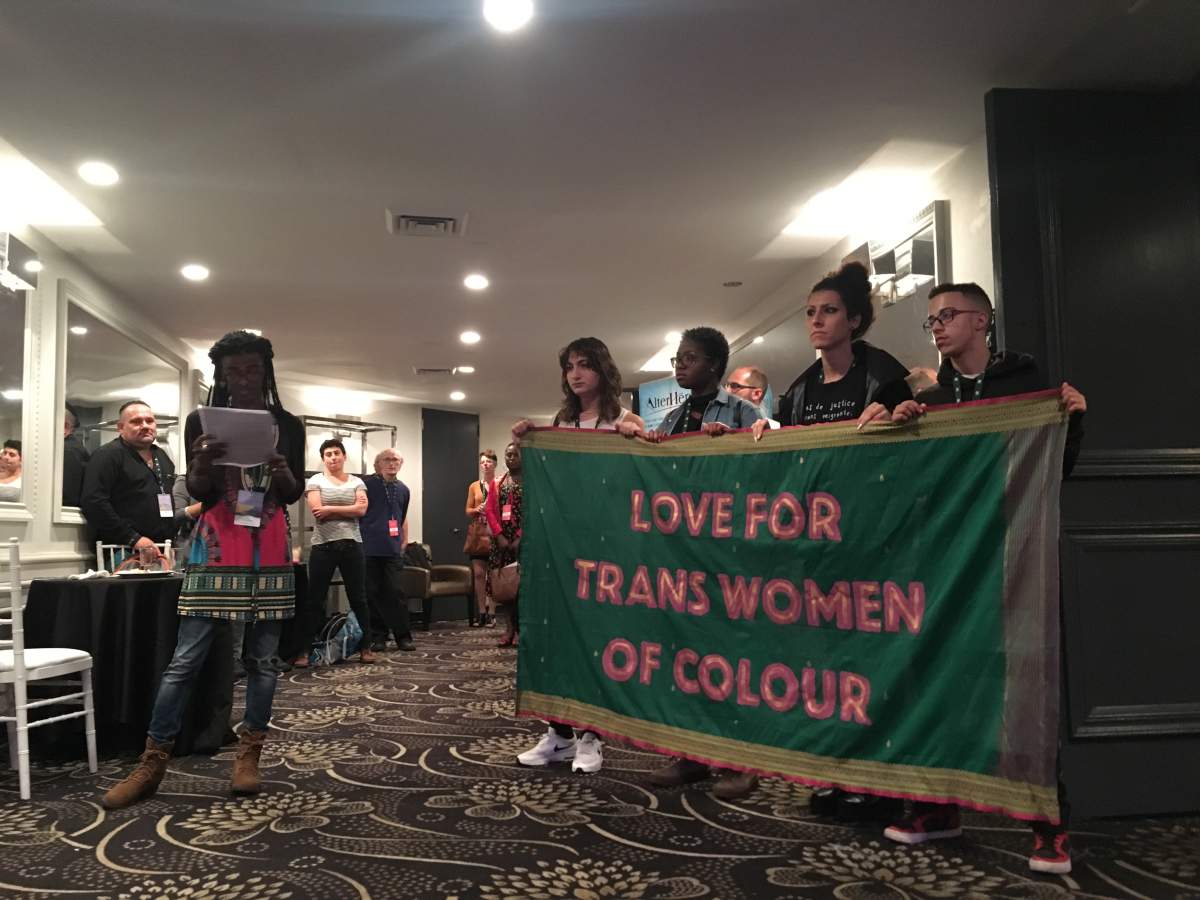 A group of trans migrants protesting outside a Pride Montreal conference. Friday August 18, 2017.