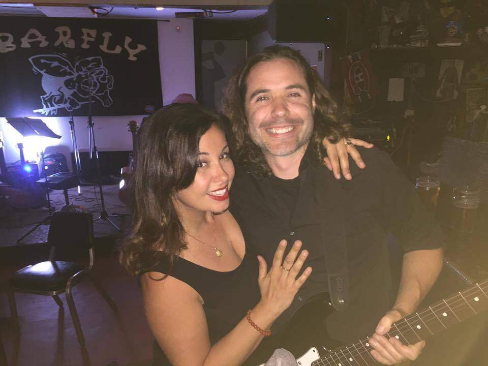 Adam Clarke and his wife, Sonia Beckhöfer-Fialho. The couple hopes to turn part of a fallen tree from the intense Montreal thunder storm into a guitar.