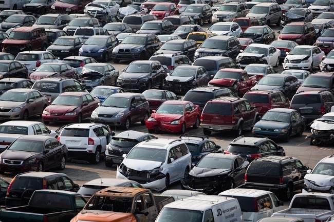 Damaged vehicles are seen at the ICBC Lower Mainland Salvage Yard, in New Westminster, B.C., on Friday August 11, 2017. 