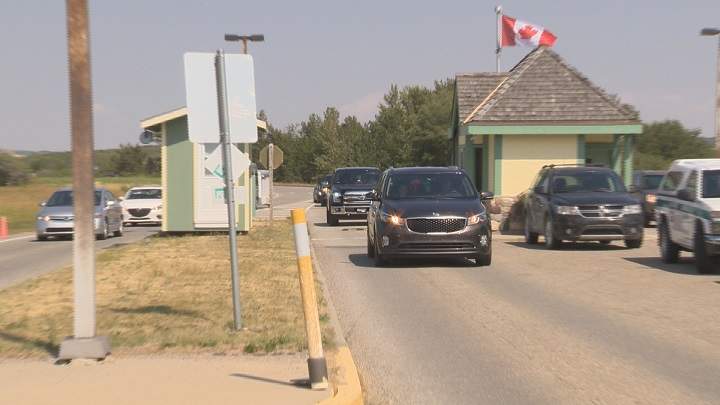 Parks Canada officials closed the gates to Waterton Lakes National Park for a short time on Sunday.
