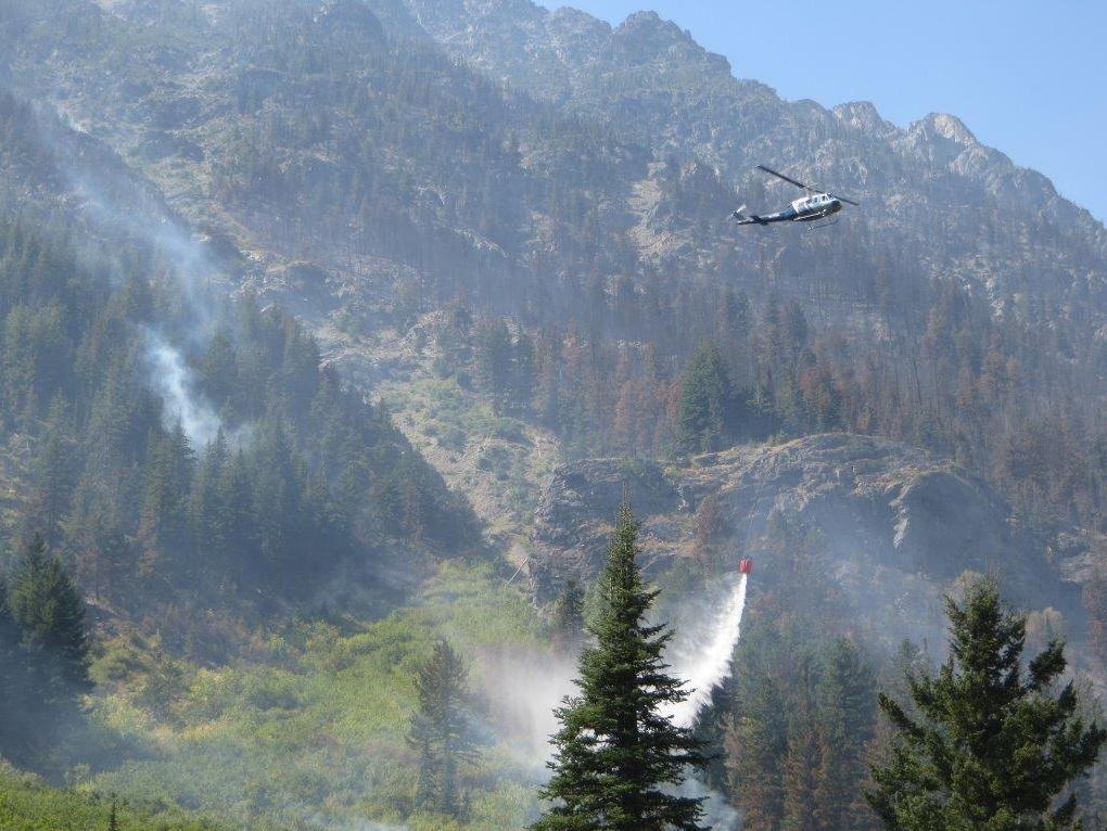 Firefighting efforts on the Diamond Creek wildfire, which originated in Washington state but is now burning in B.C.