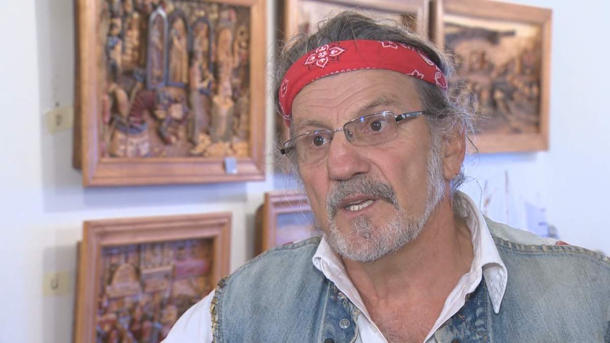 Charles Bernard, also known as "The Woodchuck," speaks about his woodcarving and past history. Bernard died on Aug. 11.