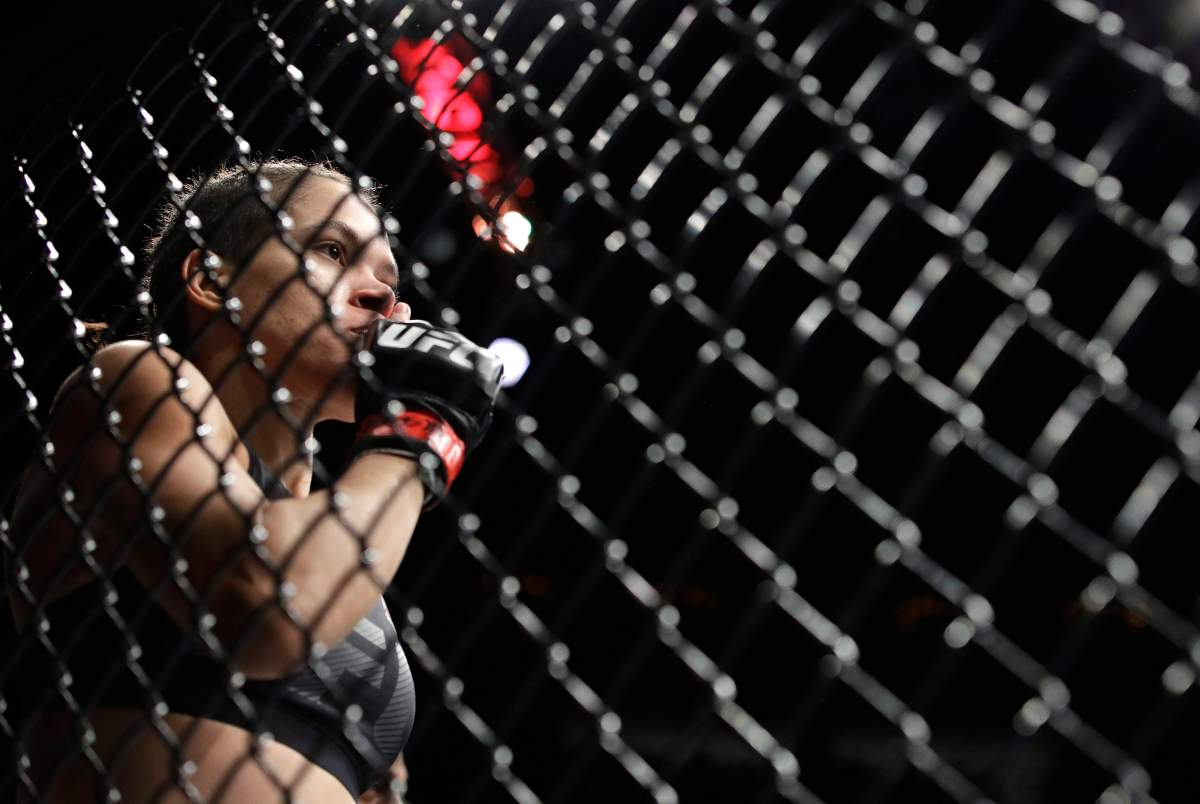 Amanda Nunes celebrates after defeating Ronda Rousey during a women’s bantamweight championship mixed martial arts bout at UFC 207, Friday, Dec. 30, 2016, in Las Vegas.