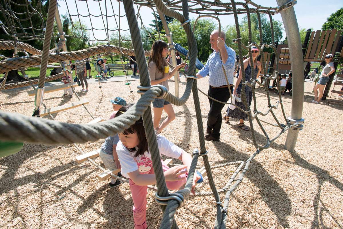B.C. NDP Leader John Horgan talks to people at a park in Vancouver, B.C. Wednesday, June 7, 2017, where he spoke about the future of daycare in the province of British Columbia.