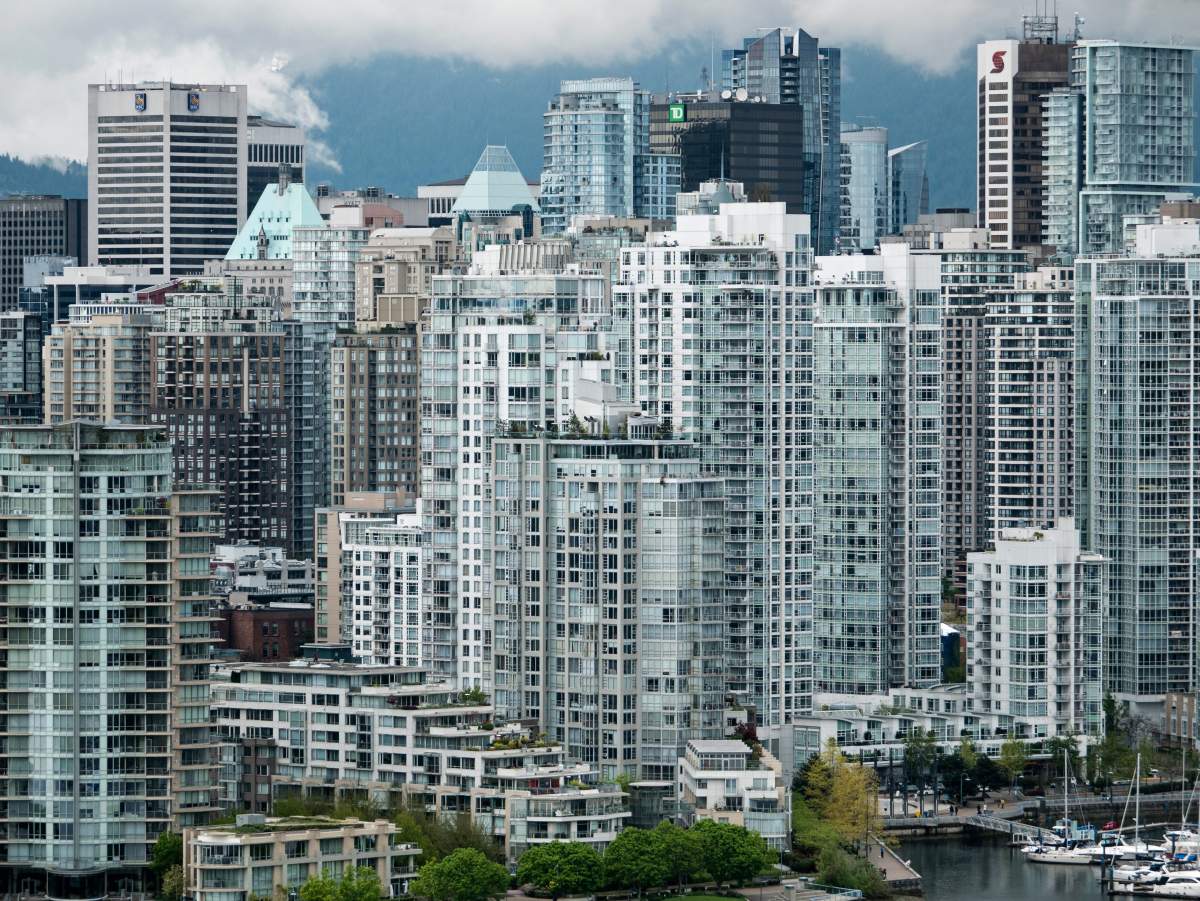A high angle view of high-rise condominium towers crowded together on the North shore of downtown Vancouver’s False Creek in Vancouver, B.C. on Friday, May 5, 2017.