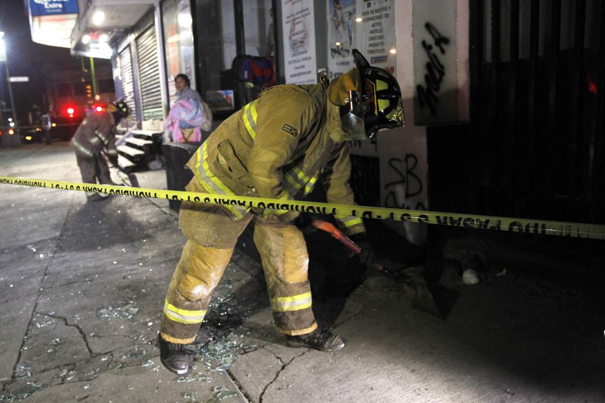 Members from the Civil Defense Forces clean debris in Mexico City, Mexico, after a 8.2 magnitude earthquake violently shook Mexico, early 08 September 2017.