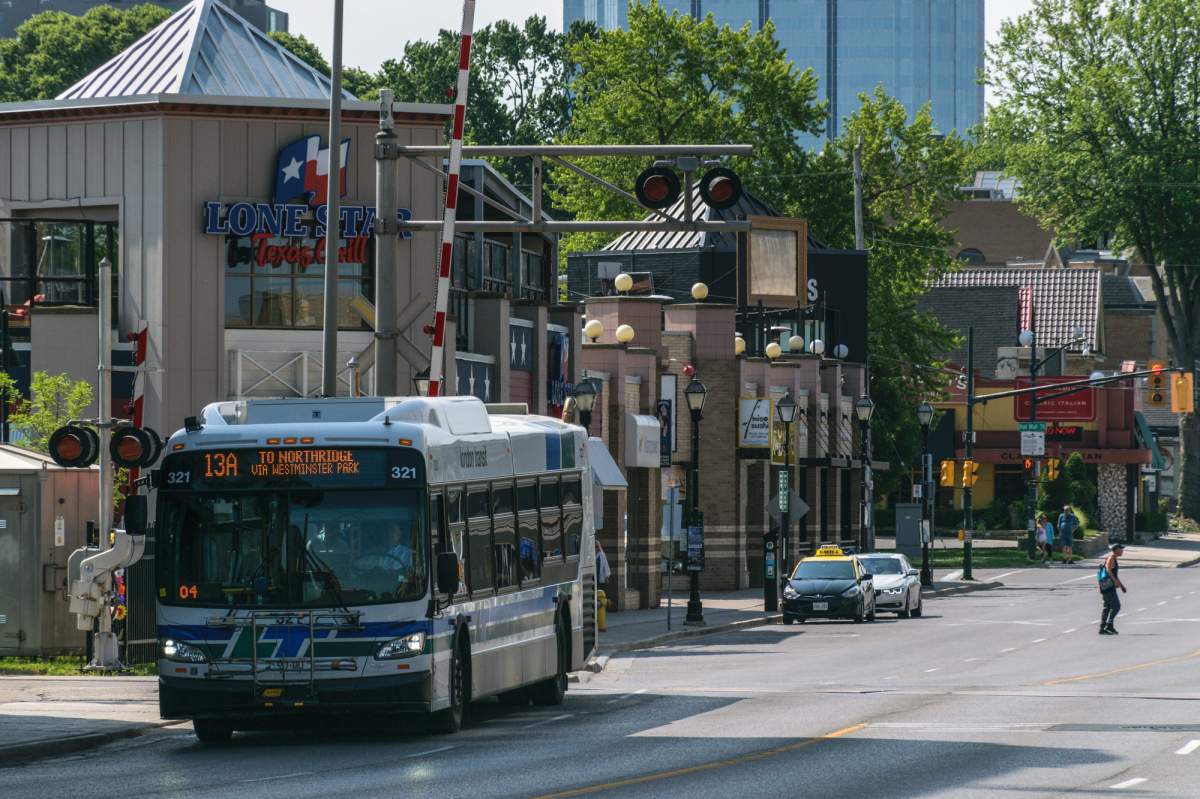 A London Transit bus crosses the CP Rail crossing on Richmond Street, June 14, 2017.